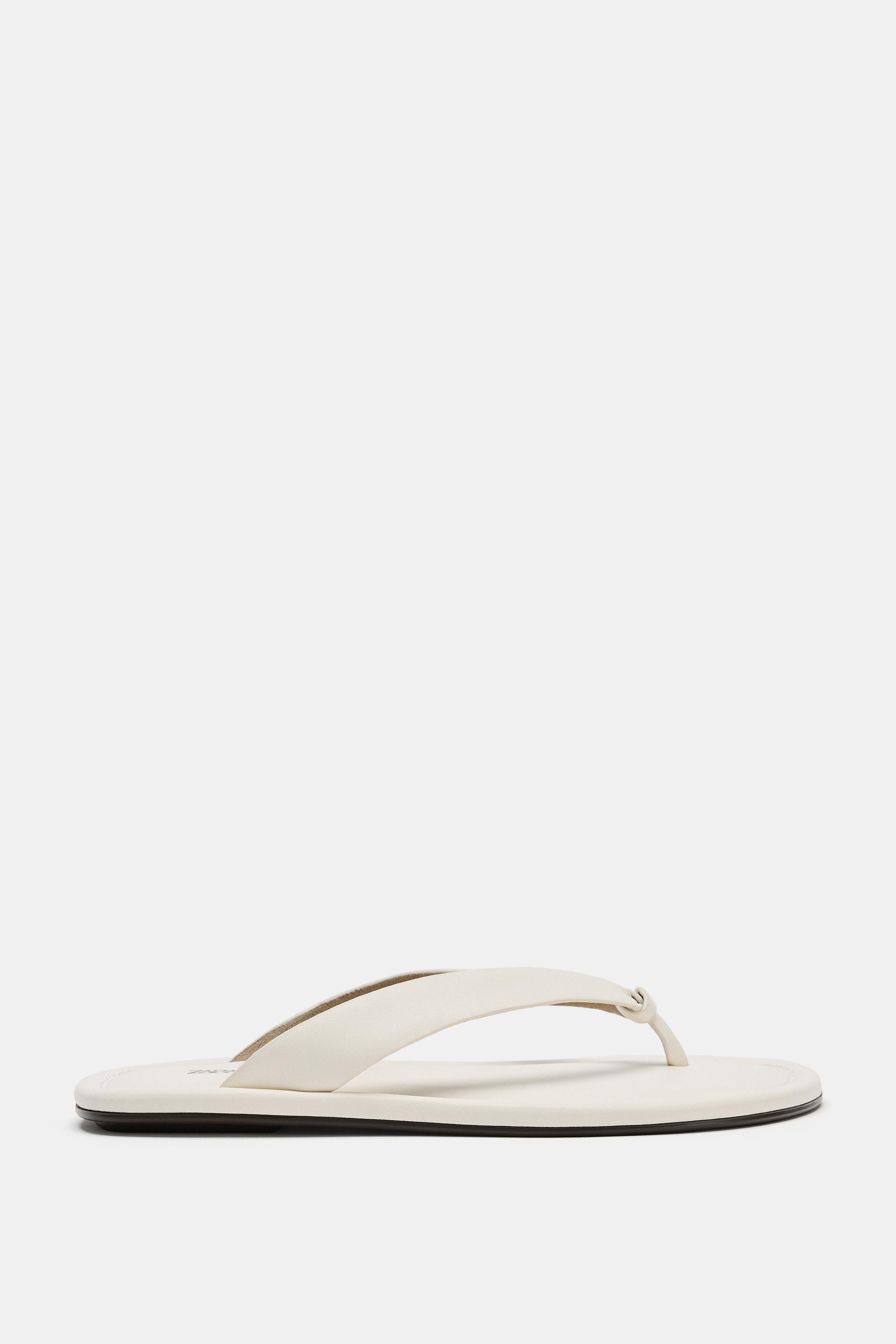 SANDALES PLATES EN CUIR